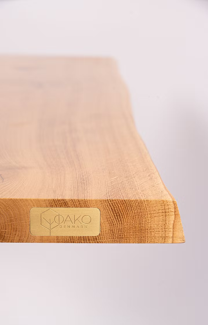Wooden product with a visible brand logo on a light background