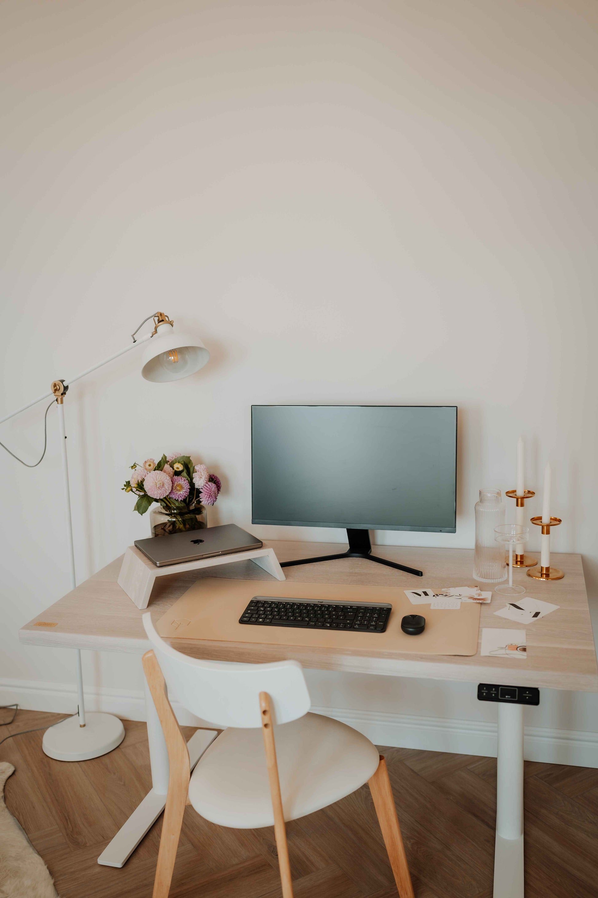 Solid Oak Standing Desk WhiteMinimalist home office setup featuring the Solid Oak Wood Standing Desk in White Mist by OakoDenmark, showcasing Scandinavian design with clean lines, premium oak wood, and advanced cable management.