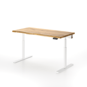 Solid oak height-adjustable desk by OAKO Denmark, featuring a natural live edge wood desktop paired with a sleek white metal frame. Designed for ergonomic comfort and modern home office aesthetics.